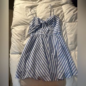 Blue and white stripe dress with central bow